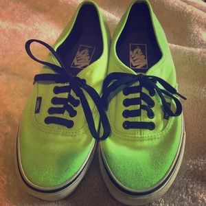 Like green sneakers. Vans of the Wall